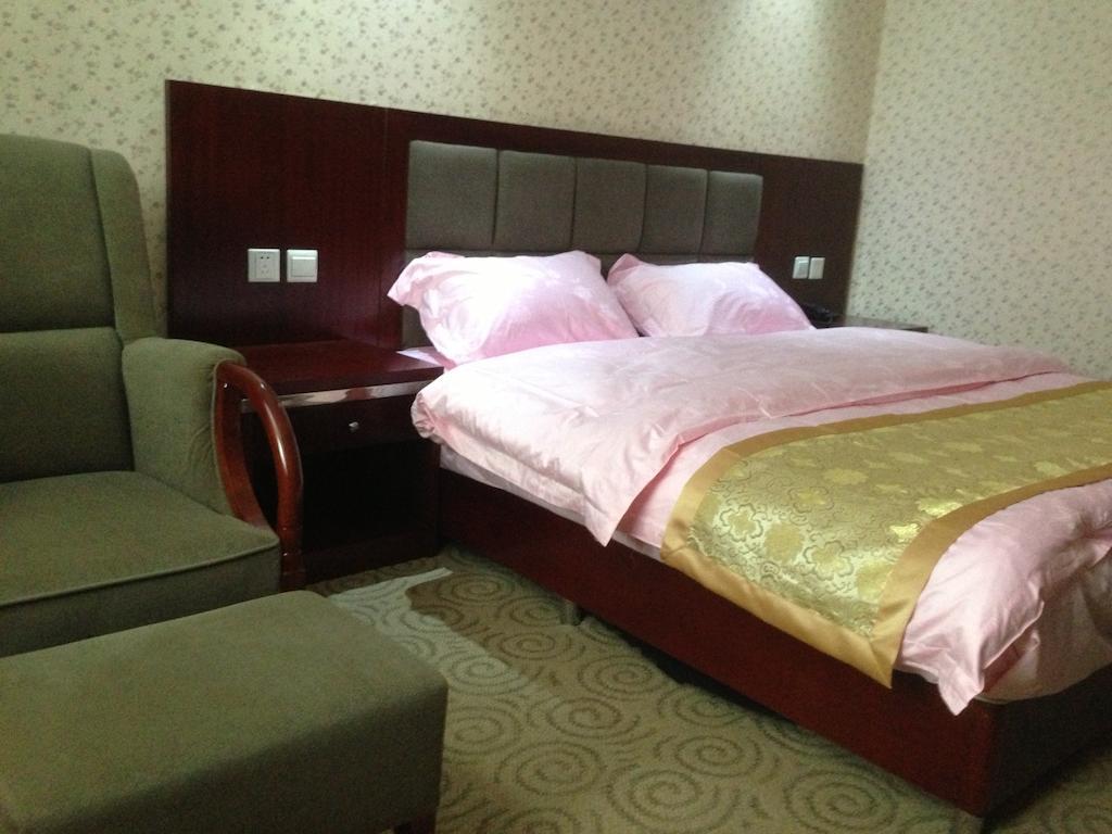 Jiuzhaigou Man Jiang Hong Hotel Room photo
